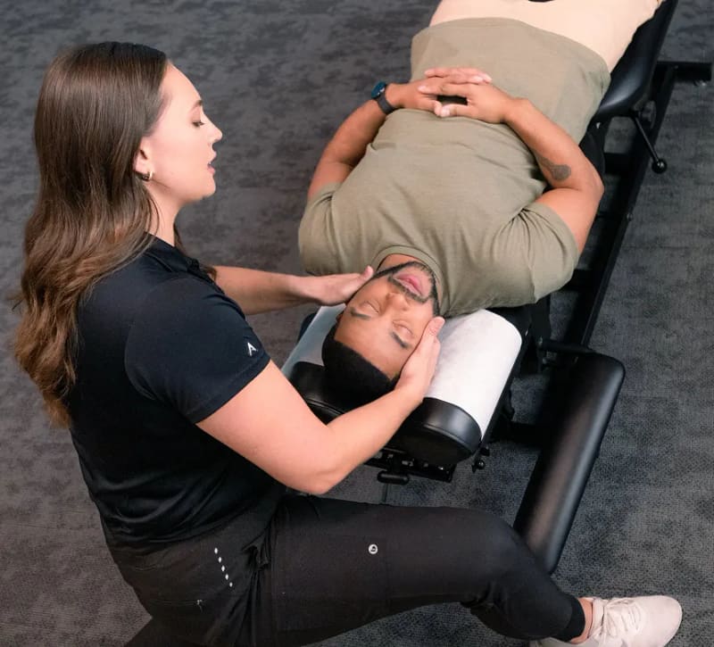 A patient looking relaxed and at ease after chiropractic care